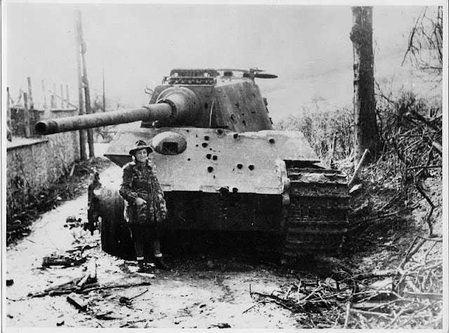 German Panzerkampfwagen VI Ausf. B Tiger II was knocked out, in France, in 1945.