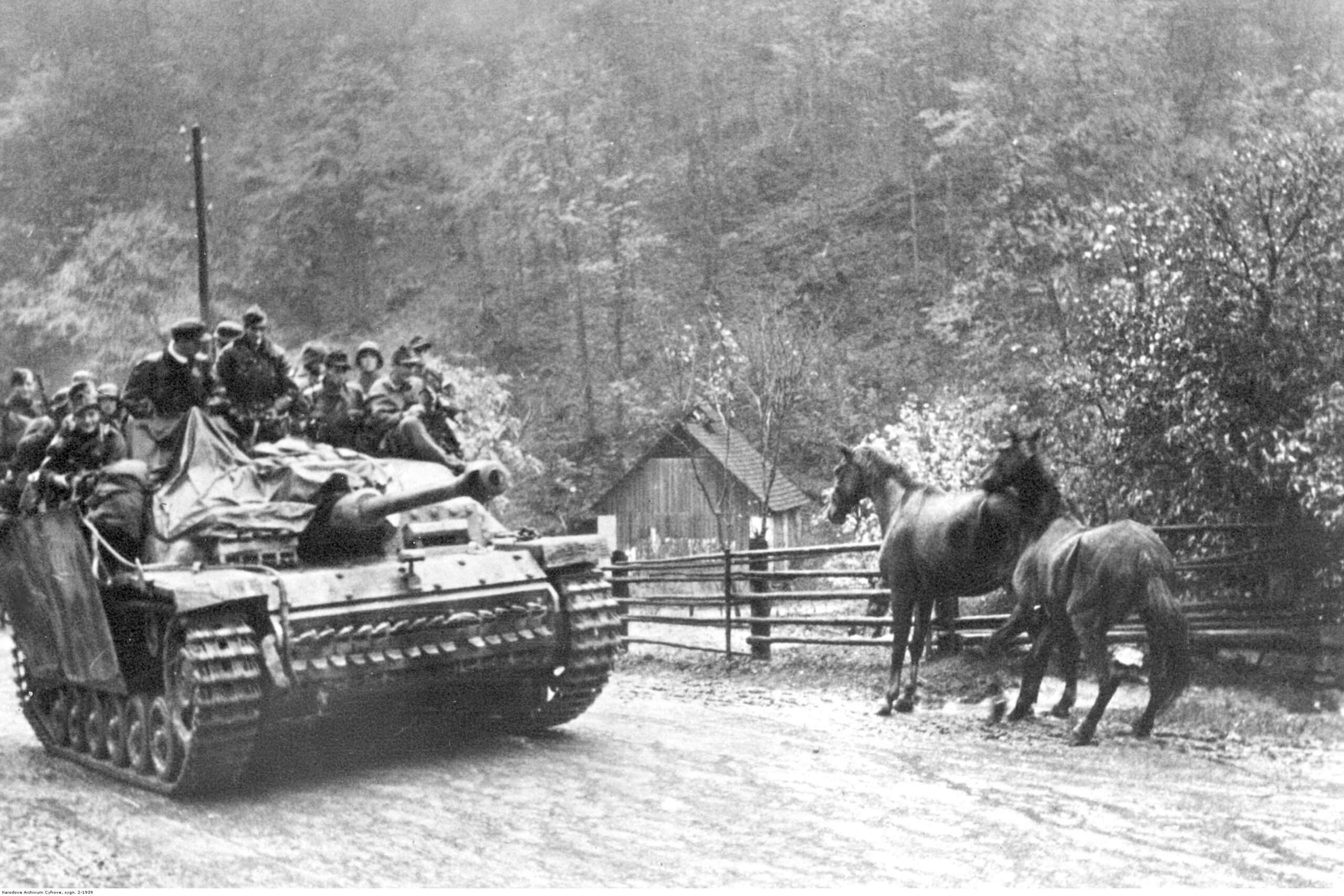 StuG III Ausf G in Slovakia, soldiers of the 18th Waffen SS Grenadier Division take a ride. Note the scared horses. Date December, 1944.